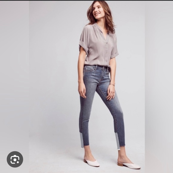 Distresses ankle bottom with a lighter color denim on back. Script - Picture 1 of 5